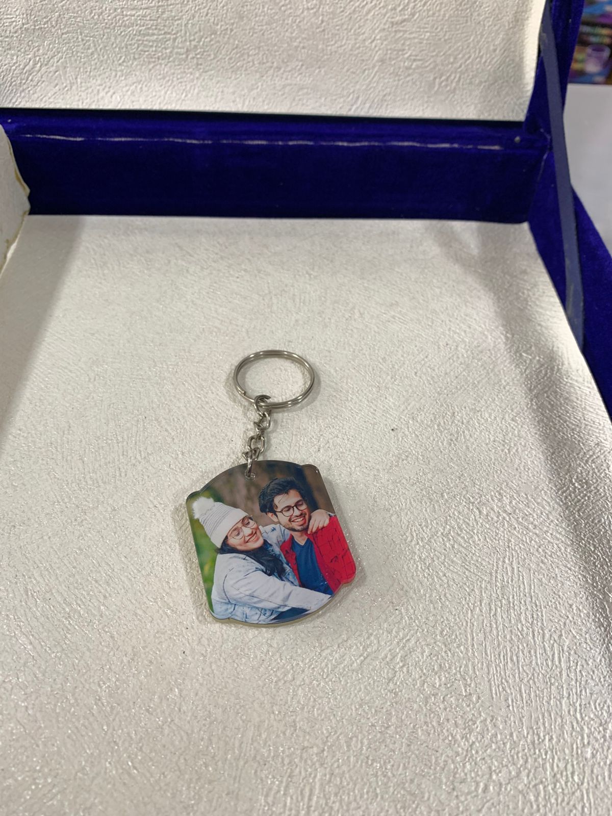 2 Custom Keychains and 9 Polaroids